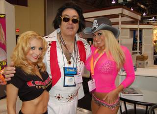 Then-Sun columnist Tom Gorman wondered if he could attract attention at the Adult Entertainment Expo in 2006 if he dressed up as Elvis.  Seems that he did.
